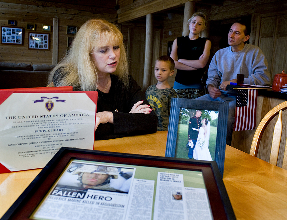 Kandy Johns talks about her son, Lance Cpl. Jordan Lee Chrobot, USMC, 24, a Frederick native who was killed in combat in Afghanistan. Jordan's brother, Connor Johns, sister, Morgan Chrobot and stepfather Jerry Johns are in the background  Chrobot was shot in the chest while on patrol in Helmand province, a Taliban stronghold.