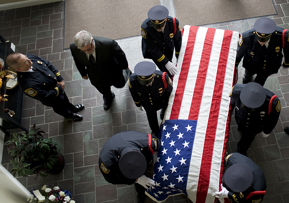 Rockingham County Firefighers escort the casket of Dennis Taylor into the Cornerstone Church of Broadway before funeral services on Friday.