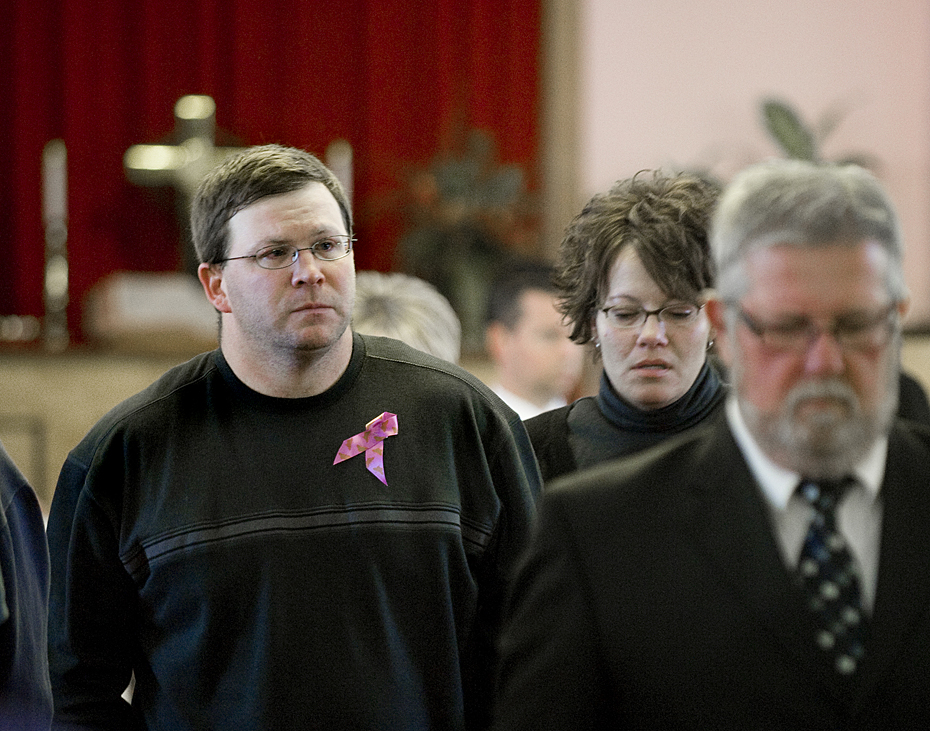 Michael Whetzel, father of 5-year-old Kaylee Grace Whetzel, leaves the memorial service for his daughter at the Mathias Church of the Brethren in Mathias, WV.
