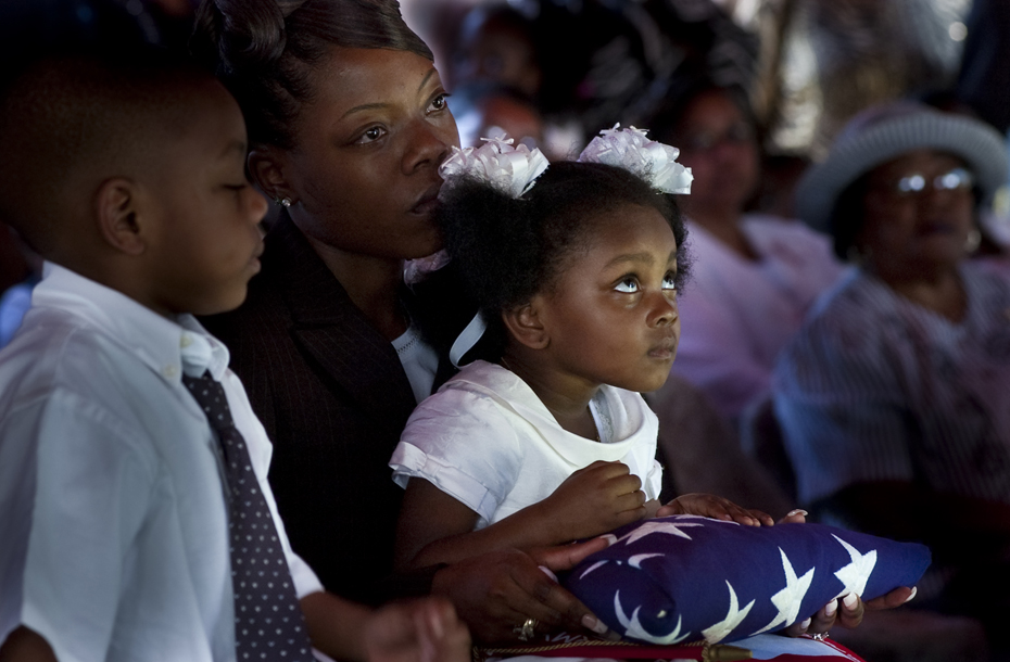 The widow and children of Esau Patterson Jr. after receiving the flag that covered his casket during gravesite services in Ridgeland, SC.