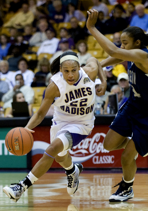 James Madison's Tarik Hislop drives past Georgetown's defense during first-half action at the JMU Convocation Center in Harrisonburg on Wednesday. JMU upset the Hoyas 79-76.