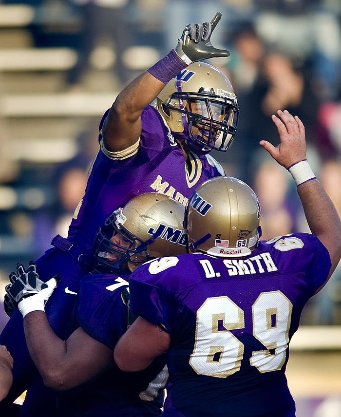 James Madison's Corwin Acker celebrates his touchdown run late in the second quarter against Towson during an NCAA college football game at Bridgeforth Stadium in Harrisonburg, Va. on Saturday, Nov. 21, 2009.