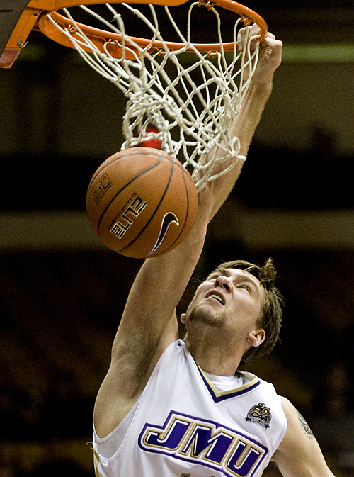 James Madison's Andrey Semenov dunks the ball during second-half action against Norfolk State in Harrisonburg on Wednesday. JMU won the game 72-64.