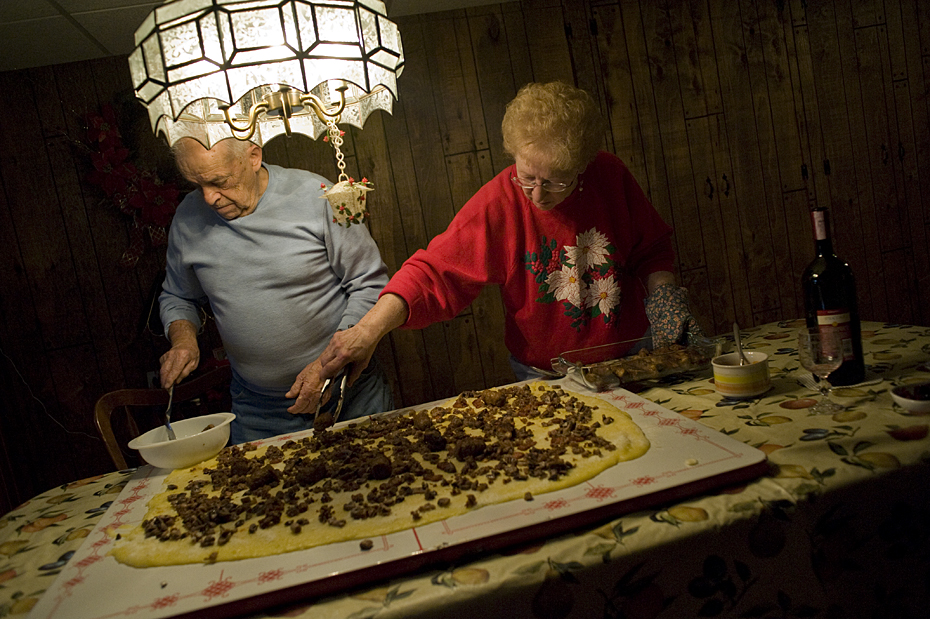 Uncle Fritz and Aunt Ann top the polenta with sausage, bacon, cheese, mushrooms and ribs.