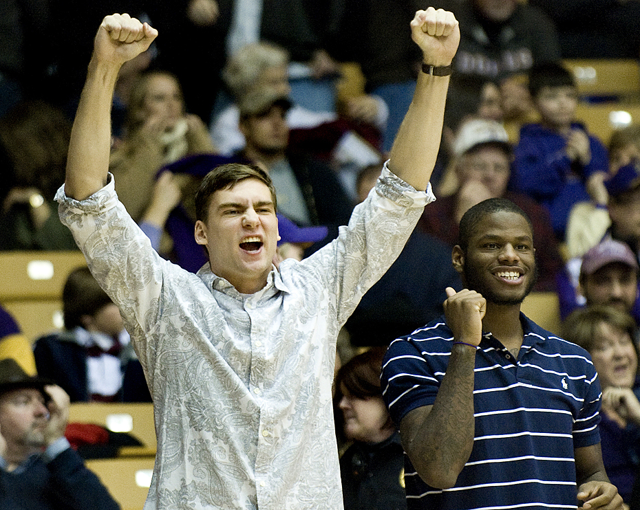 James Madison's Andrey Semenov cheers on his team from the bench during second-half action against Delaware at the JMU Convo on Monday night.