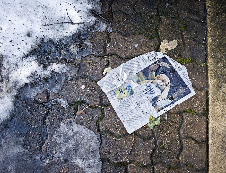 While walking around downtown looking for a feature photo today I came across this page from our paper with my photo on it  laying in the street near the melting snow. So much about this scene seemed fitting for this post.